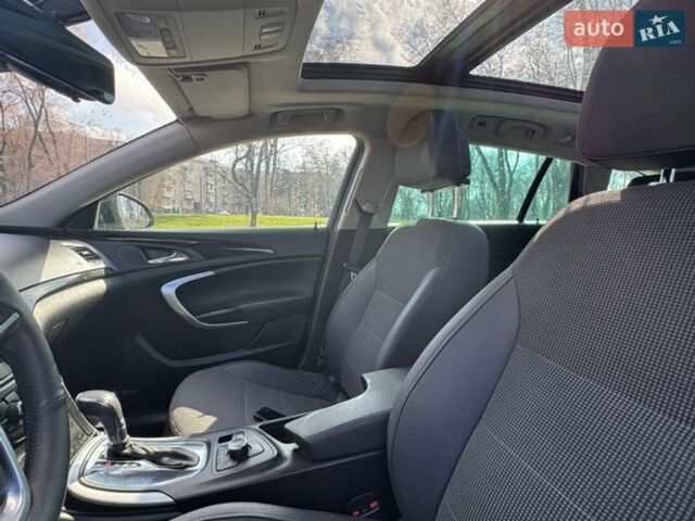 Черный Опель Инсигния, объемом двигателя 1.96 л и пробегом 190 тыс. км за 8600 $, фото 4 на Automoto.ua