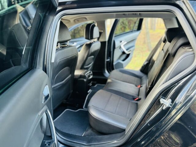 Черный Опель Инсигния, объемом двигателя 2 л и пробегом 97 тыс. км за 8800 $, фото 13 на Automoto.ua