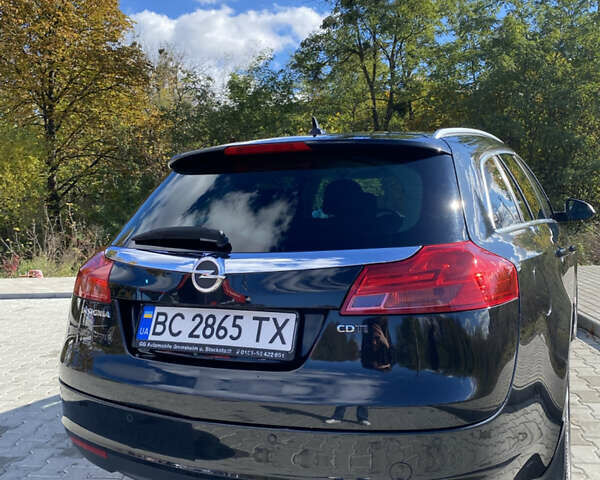 Чорний Опель Інсігнія, об'ємом двигуна 1.96 л та пробігом 231 тис. км за 7500 $, фото 6 на Automoto.ua