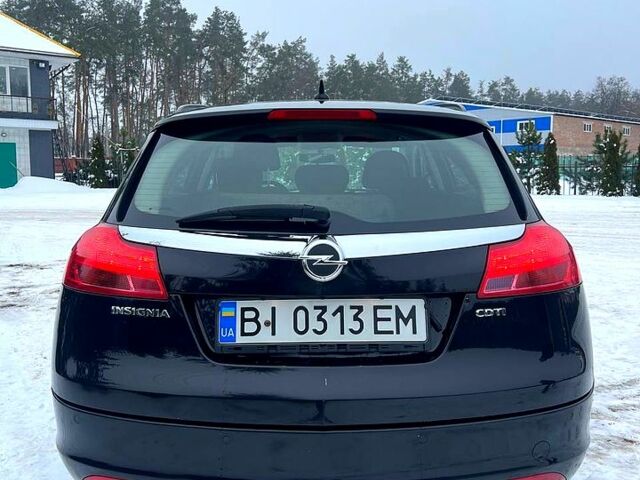 Чорний Опель Інсігнія, об'ємом двигуна 2 л та пробігом 280 тис. км за 6500 $, фото 6 на Automoto.ua