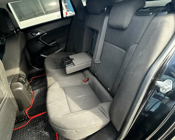 Чорний Опель Інсігнія, об'ємом двигуна 1.96 л та пробігом 220 тис. км за 6450 $, фото 16 на Automoto.ua