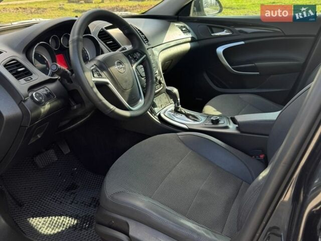 Черный Опель Инсигния, объемом двигателя 1.96 л и пробегом 190 тыс. км за 8600 $, фото 3 на Automoto.ua