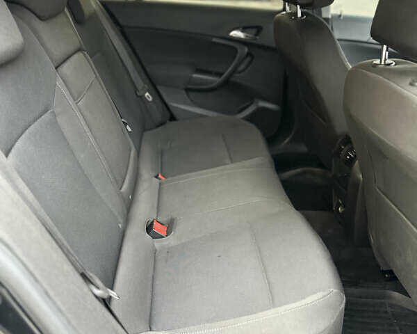 Черный Опель Инсигния, объемом двигателя 2 л и пробегом 194 тыс. км за 7500 $, фото 21 на Automoto.ua