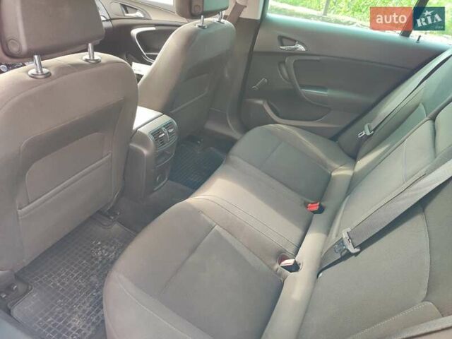 Черный Опель Инсигния, объемом двигателя 2 л и пробегом 278 тыс. км за 7500 $, фото 6 на Automoto.ua