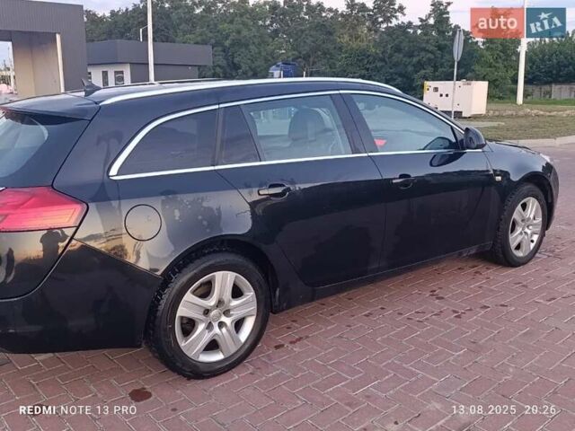 Чорний Опель Інсігнія, об'ємом двигуна 2 л та пробігом 242 тис. км за 6500 $, фото 8 на Automoto.ua