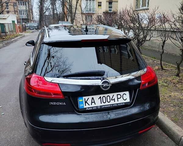 Черный Опель Инсигния, объемом двигателя 1.8 л и пробегом 240 тыс. км за 7599 $, фото 2 на Automoto.ua