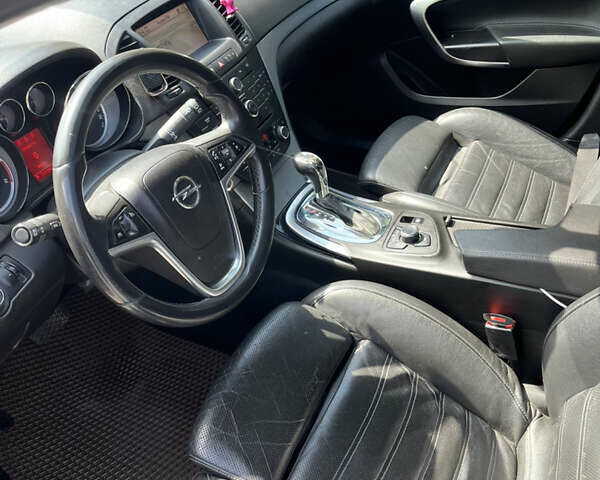 Чорний Опель Інсігнія, об'ємом двигуна 1.96 л та пробігом 245 тис. км за 7800 $, фото 2 на Automoto.ua