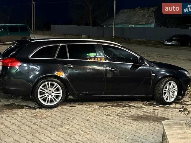 Чорний Опель Інсігнія, об'ємом двигуна 2 л та пробігом 296 тис. км за 7000 $, фото 4 на Automoto.ua