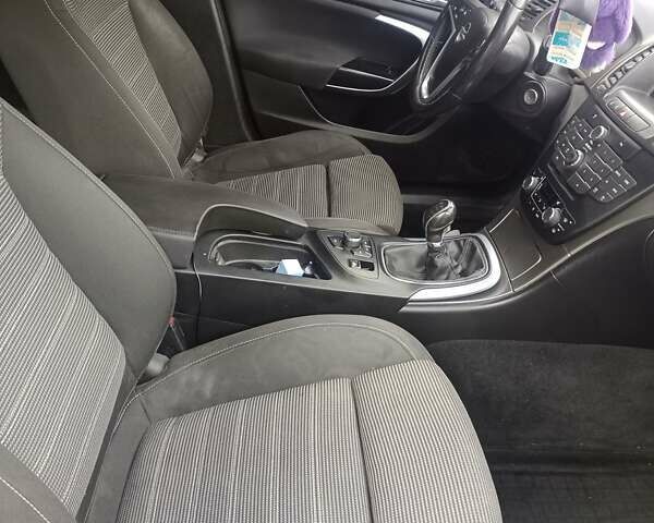 Черный Опель Инсигния, объемом двигателя 1.96 л и пробегом 206 тыс. км за 7200 $, фото 10 на Automoto.ua