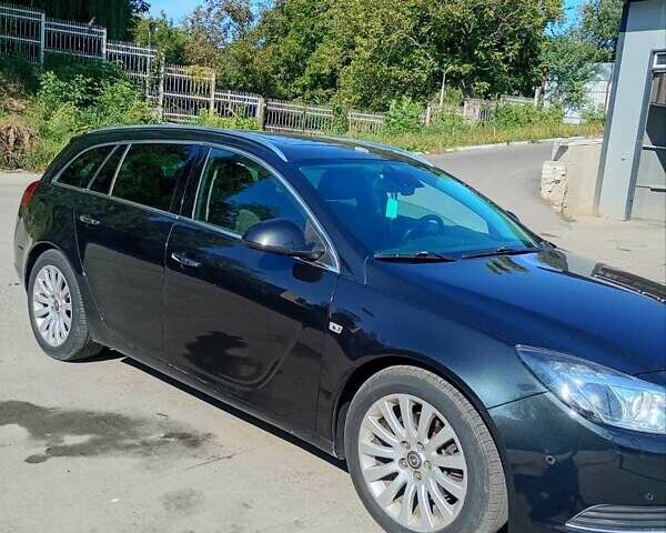 Черный Опель Инсигния, объемом двигателя 2 л и пробегом 322 тыс. км за 7500 $, фото 3 на Automoto.ua