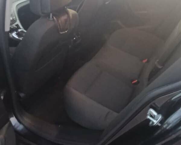 Чорний Опель Інсігнія, об'ємом двигуна 2 л та пробігом 242 тис. км за 6500 $, фото 4 на Automoto.ua