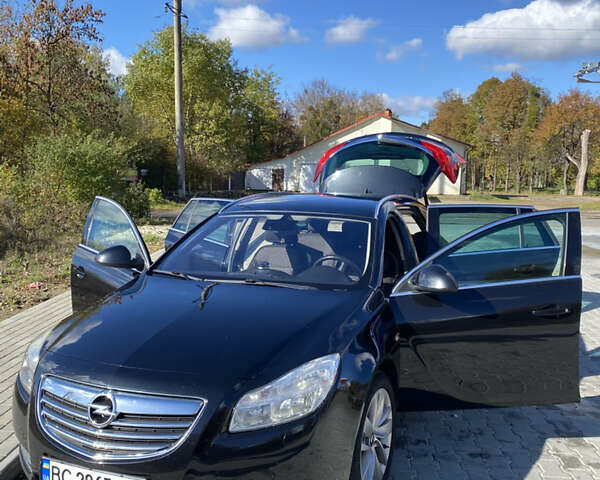 Чорний Опель Інсігнія, об'ємом двигуна 1.96 л та пробігом 231 тис. км за 7500 $, фото 1 на Automoto.ua