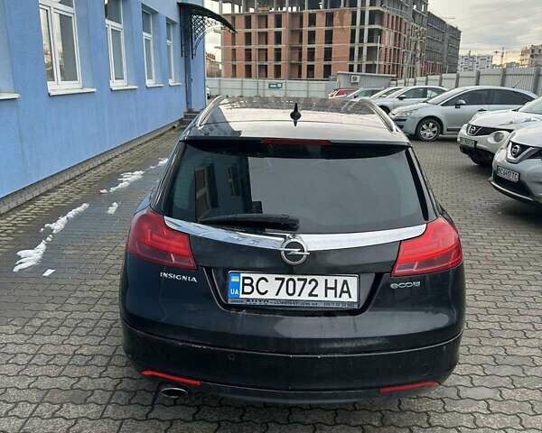 Чорний Опель Інсігнія, об'ємом двигуна 1.96 л та пробігом 306 тис. км за 6500 $, фото 4 на Automoto.ua