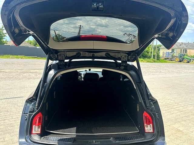 Черный Опель Инсигния, объемом двигателя 2 л и пробегом 296 тыс. км за 7000 $, фото 12 на Automoto.ua