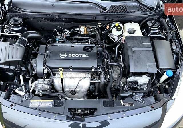 Чорний Опель Інсігнія, об'ємом двигуна 1.8 л та пробігом 189 тис. км за 7700 $, фото 25 на Automoto.ua