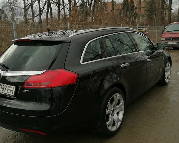 Черный Опель Инсигния, объемом двигателя 2 л и пробегом 310 тыс. км за 7500 $, фото 4 на Automoto.ua