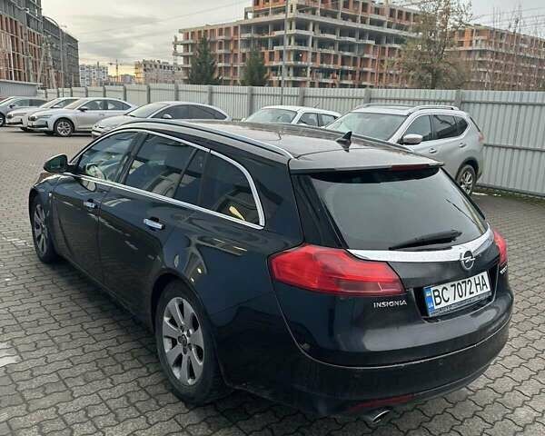 Чорний Опель Інсігнія, об'ємом двигуна 1.96 л та пробігом 306 тис. км за 6500 $, фото 3 на Automoto.ua