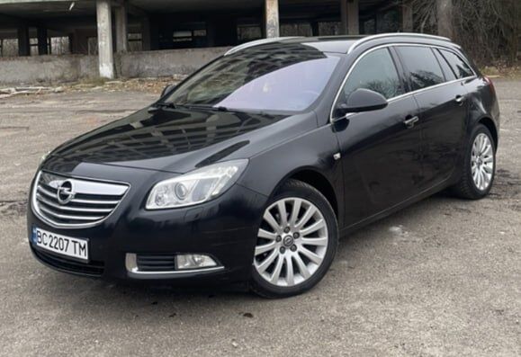 Черный Опель Инсигния, объемом двигателя 2 л и пробегом 0 тыс. км за 8000 $, фото 4 на Automoto.ua
