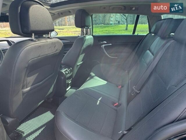 Черный Опель Инсигния, объемом двигателя 1.96 л и пробегом 190 тыс. км за 8600 $, фото 5 на Automoto.ua