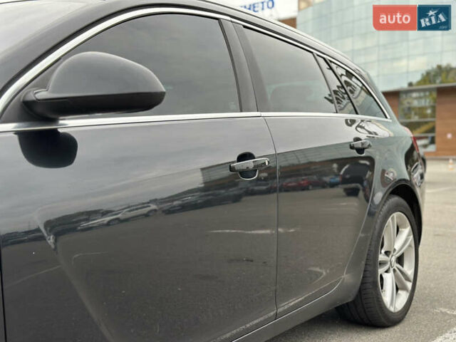 Чорний Опель Інсігнія, об'ємом двигуна 1.96 л та пробігом 324 тис. км за 6900 $, фото 2 на Automoto.ua