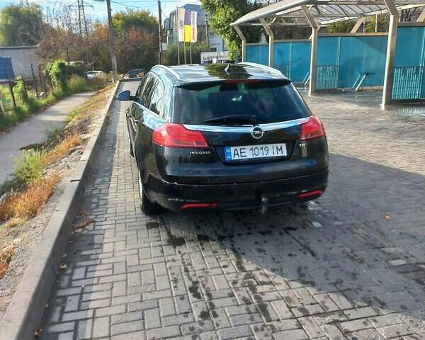 Черный Опель Инсигния, объемом двигателя 1.96 л и пробегом 372 тыс. км за 7200 $, фото 3 на Automoto.ua
