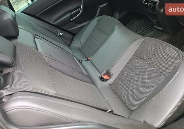 Черный Опель Инсигния, объемом двигателя 2 л и пробегом 215 тыс. км за 7250 $, фото 57 на Automoto.ua