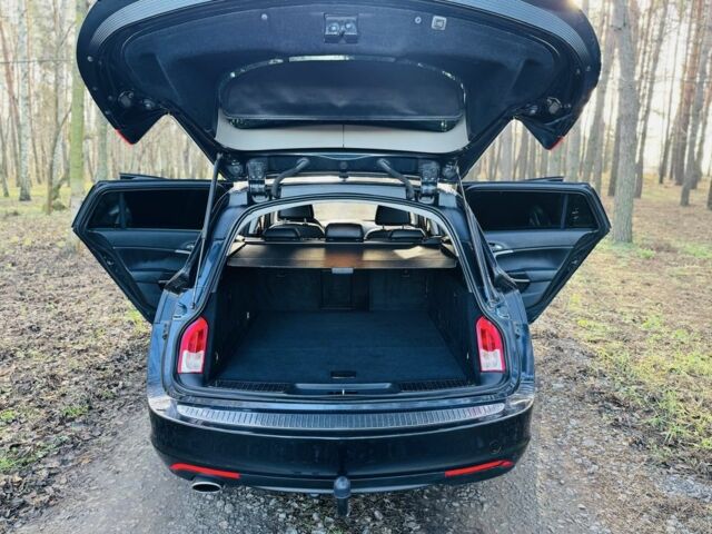 Черный Опель Инсигния, объемом двигателя 2 л и пробегом 97 тыс. км за 8800 $, фото 14 на Automoto.ua