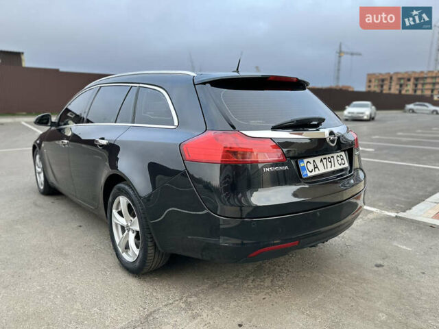 Черный Опель Инсигния, объемом двигателя 2 л и пробегом 194 тыс. км за 7500 $, фото 6 на Automoto.ua