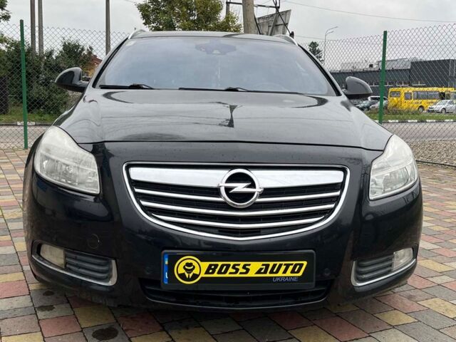 Черный Опель Инсигния, объемом двигателя 2 л и пробегом 237 тыс. км за 6700 $, фото 1 на Automoto.ua