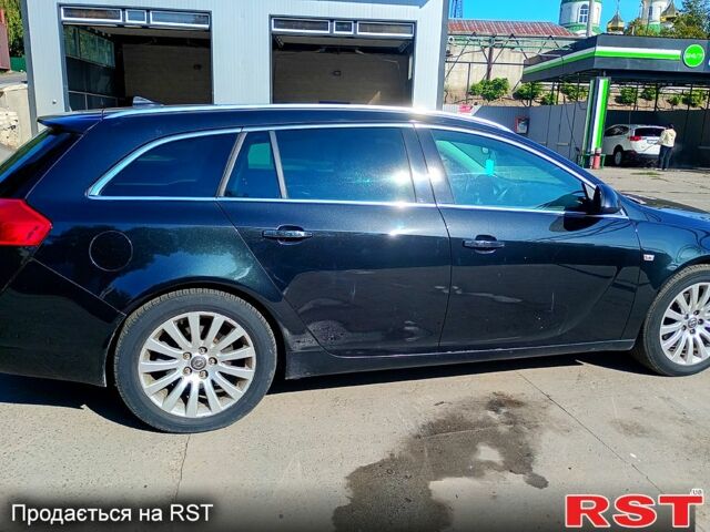 Черный Опель Инсигния, объемом двигателя 2 л и пробегом 322 тыс. км за 7500 $, фото 2 на Automoto.ua