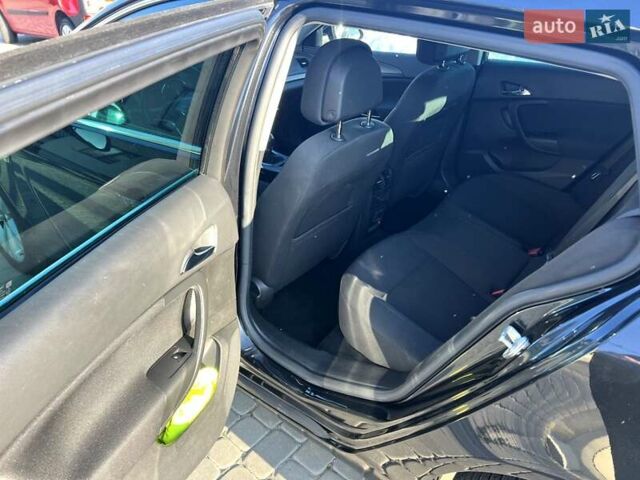 Черный Опель Инсигния, объемом двигателя 1.6 л и пробегом 200 тыс. км за 7999 $, фото 17 на Automoto.ua