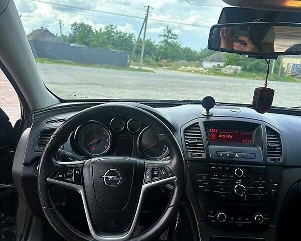 Чорний Опель Інсігнія, об'ємом двигуна 2 л та пробігом 296 тис. км за 7000 $, фото 7 на Automoto.ua