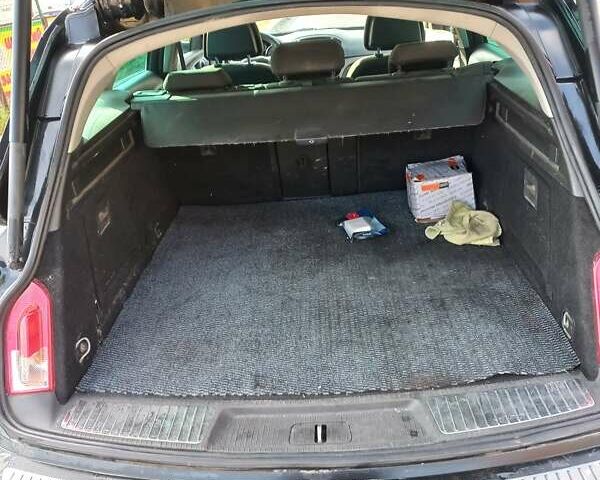 Черный Опель Инсигния, объемом двигателя 1.96 л и пробегом 372 тыс. км за 7200 $, фото 10 на Automoto.ua