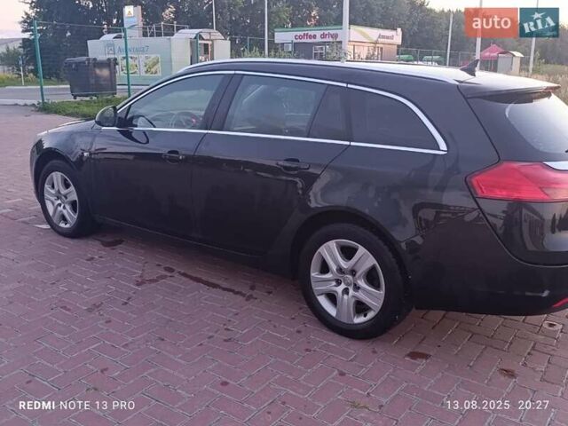 Чорний Опель Інсігнія, об'ємом двигуна 2 л та пробігом 242 тис. км за 6500 $, фото 2 на Automoto.ua
