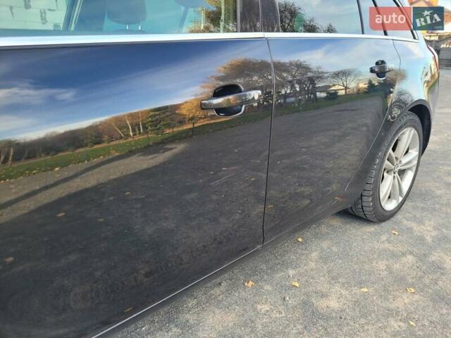 Чорний Опель Інсігнія, об'ємом двигуна 1.96 л та пробігом 225 тис. км за 7500 $, фото 8 на Automoto.ua