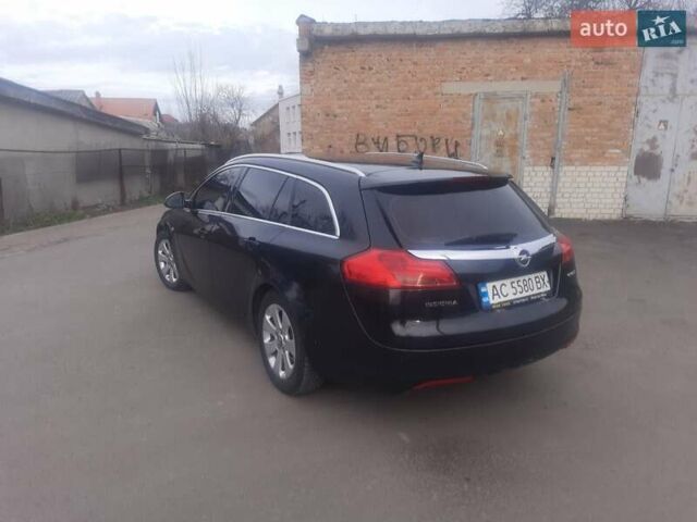 Черный Опель Инсигния, объемом двигателя 1.96 л и пробегом 310 тыс. км за 5555 $, фото 1 на Automoto.ua