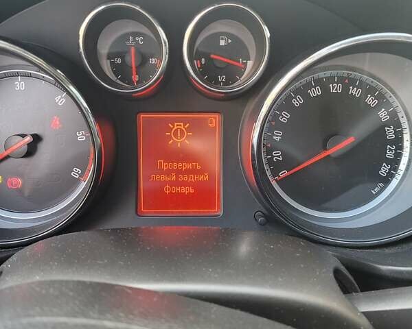 Чорний Опель Інсігнія, об'ємом двигуна 1.96 л та пробігом 225 тис. км за 7500 $, фото 2 на Automoto.ua