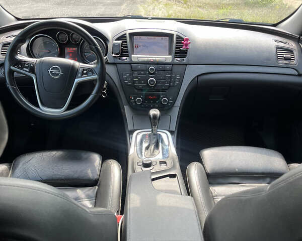 Чорний Опель Інсігнія, об'ємом двигуна 1.96 л та пробігом 245 тис. км за 7800 $, фото 1 на Automoto.ua