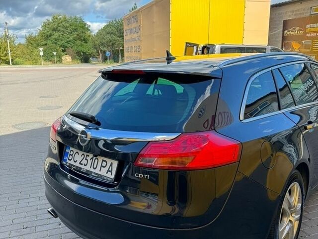 Чорний Опель Інсігнія, об'ємом двигуна 1.96 л та пробігом 300 тис. км за 8500 $, фото 4 на Automoto.ua