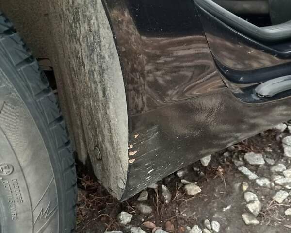 Черный Опель Инсигния, объемом двигателя 1.96 л и пробегом 206 тыс. км за 7200 $, фото 14 на Automoto.ua