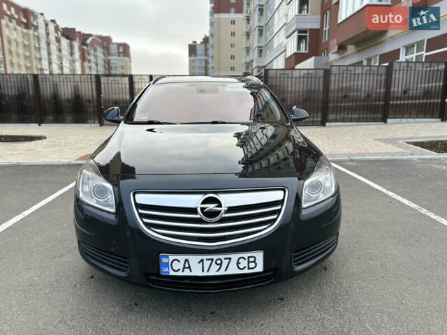 Черный Опель Инсигния, объемом двигателя 2 л и пробегом 194 тыс. км за 7500 $, фото 1 на Automoto.ua