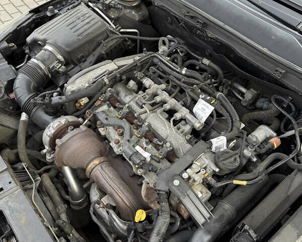 Черный Опель Инсигния, объемом двигателя 1.96 л и пробегом 305 тыс. км за 7999 $, фото 6 на Automoto.ua