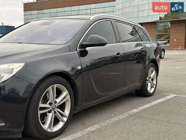 Чорний Опель Інсігнія, об'ємом двигуна 1.96 л та пробігом 324 тис. км за 6900 $, фото 1 на Automoto.ua