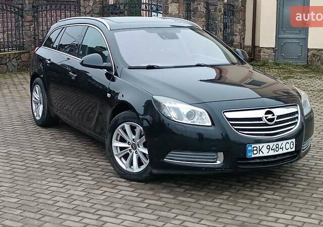 Черный Опель Инсигния, объемом двигателя 2 л и пробегом 215 тыс. км за 7250 $, фото 5 на Automoto.ua