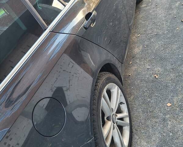 Чорний Опель Інсігнія, об'ємом двигуна 1.96 л та пробігом 225 тис. км за 7500 $, фото 19 на Automoto.ua