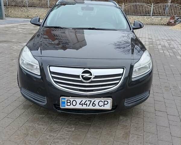Чорний Опель Інсігнія, об'ємом двигуна 1.96 л та пробігом 179 тис. км за 6399 $, фото 6 на Automoto.ua