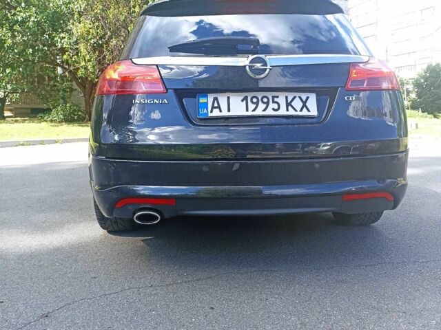 Черный Опель Инсигния, объемом двигателя 2 л и пробегом 325 тыс. км за 5800 $, фото 4 на Automoto.ua