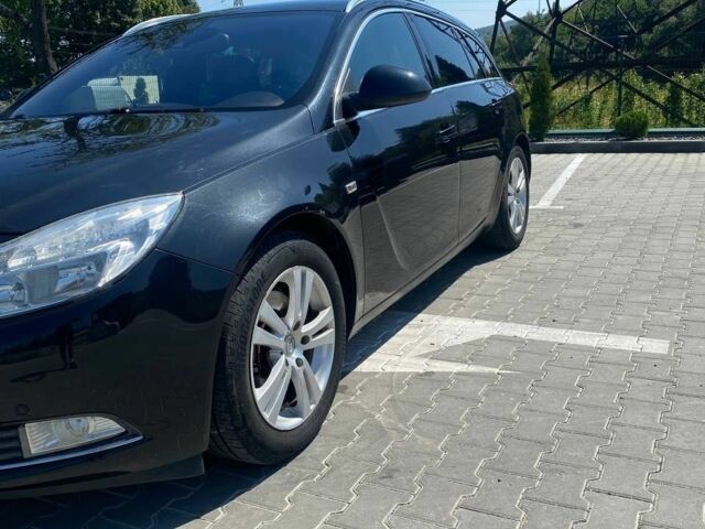 Черный Опель Инсигния, объемом двигателя 2 л и пробегом 250 тыс. км за 6300 $, фото 1 на Automoto.ua