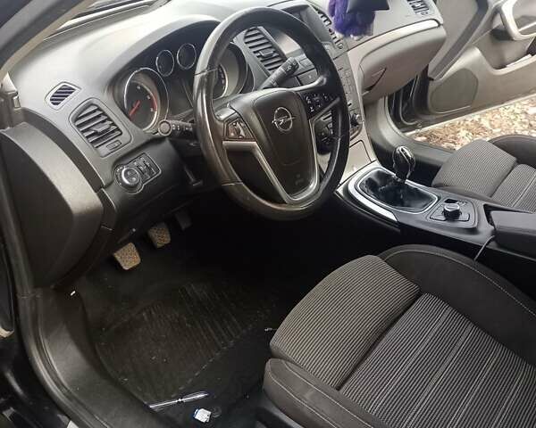 Черный Опель Инсигния, объемом двигателя 1.96 л и пробегом 206 тыс. км за 7200 $, фото 4 на Automoto.ua