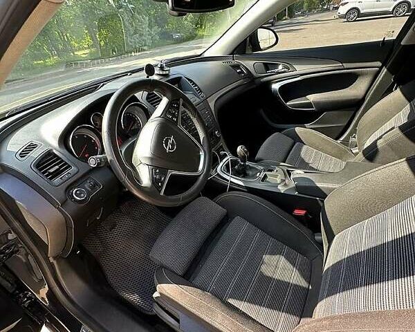 Чорний Опель Інсігнія, об'ємом двигуна 2 л та пробігом 296 тис. км за 7000 $, фото 6 на Automoto.ua